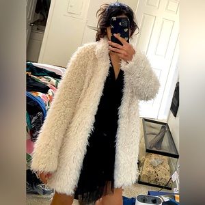 White faux fur coat